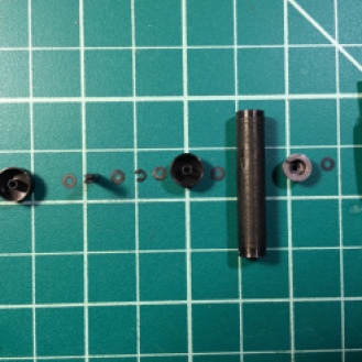 All the components of the first shutter curtain roller, ready for cleaning and lubricating