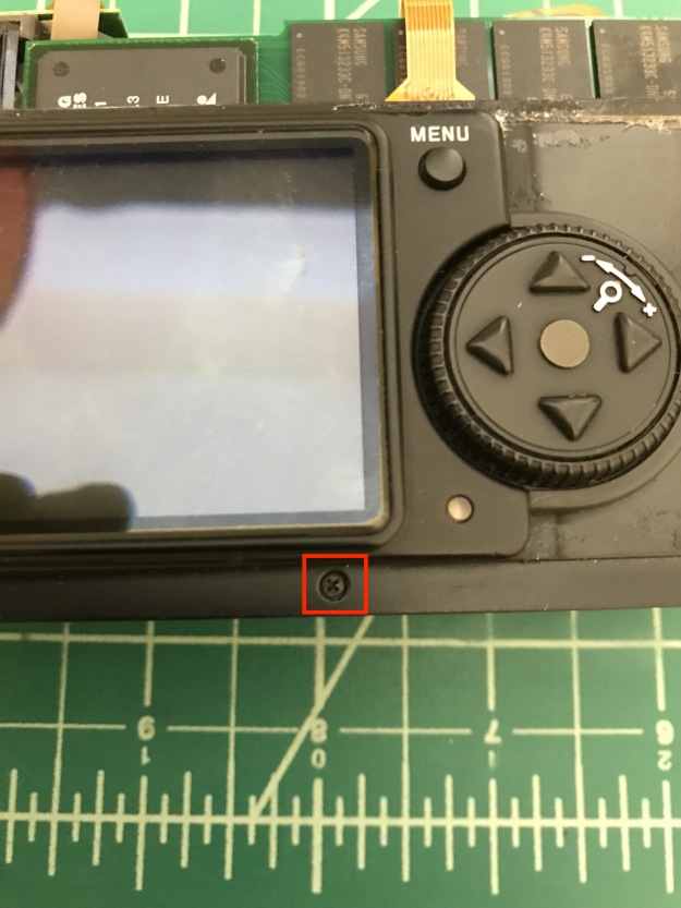 Remove the screw under the LCD