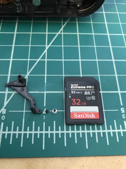 Next to an SD card, to give you an idea of the dimensions