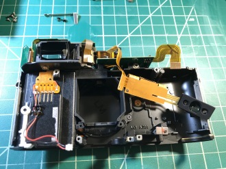 Move the light meter to one side, be careful not to break the very thin flex cable